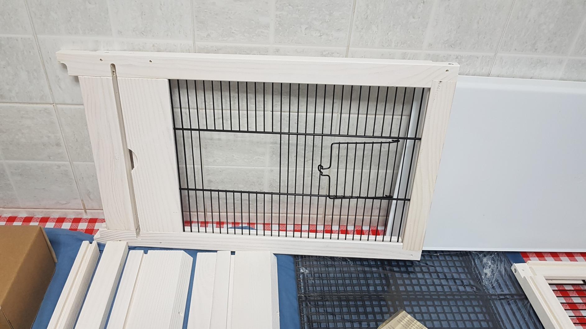 Très belle cage en bois